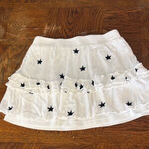 Storia White Mini Skirt with Black Star Details